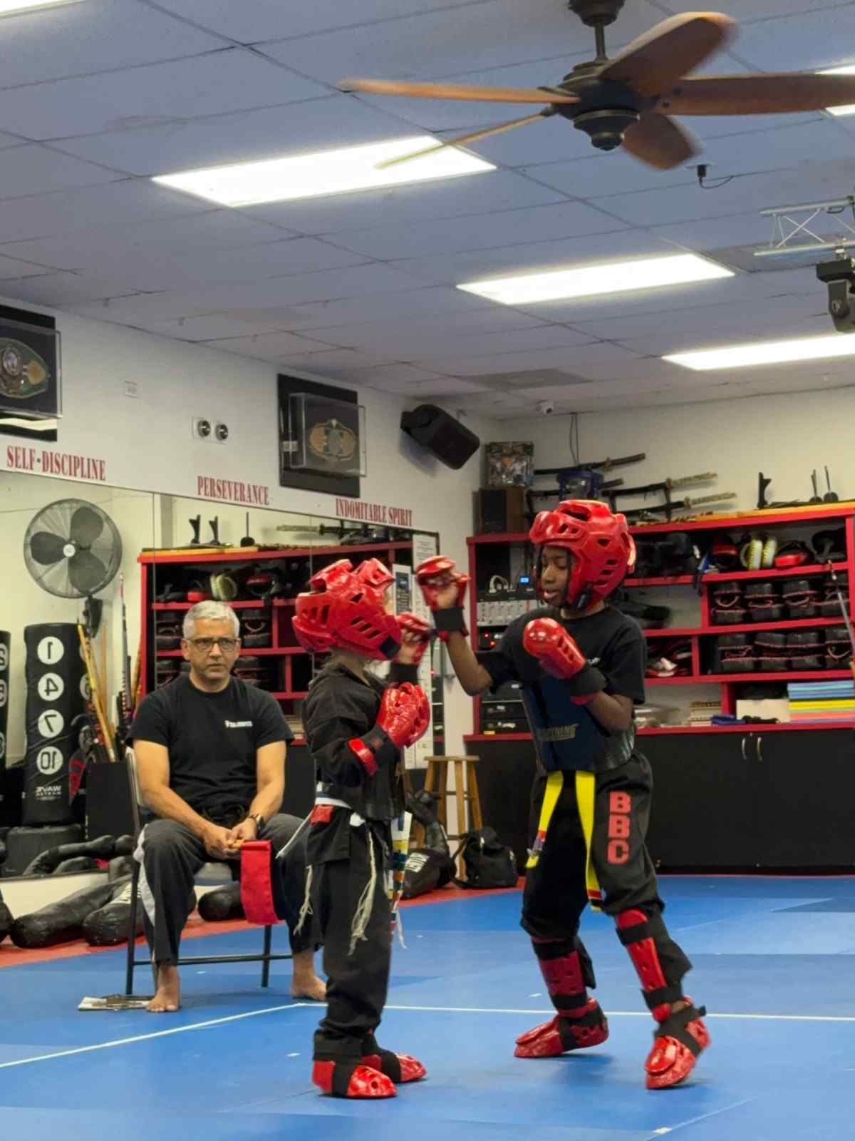 kids learning discipline through martial arts benefits