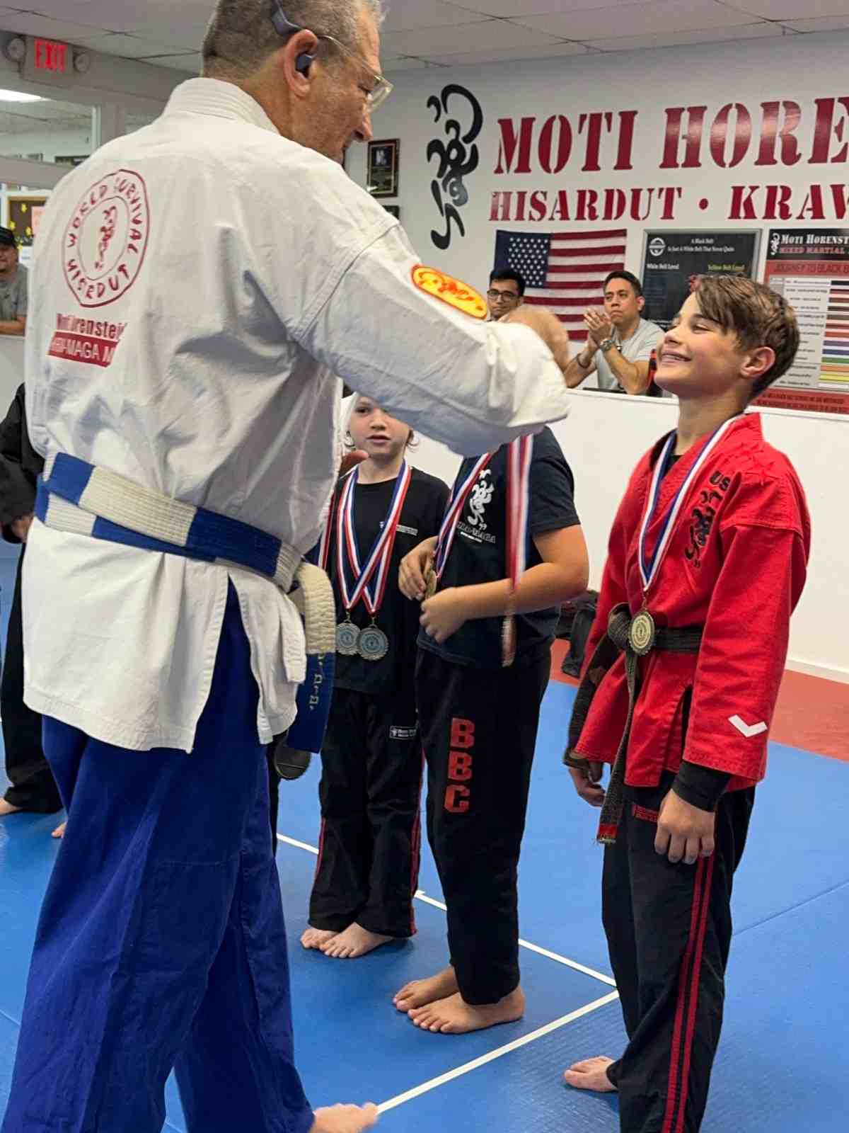 children showing improved behavior from martial arts benefits